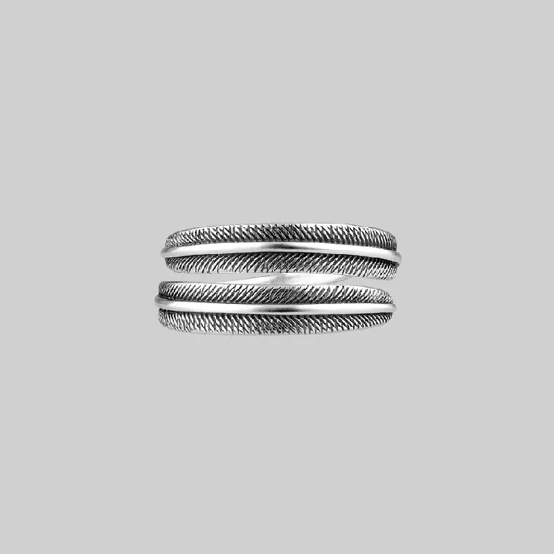 AWAKEN. Feather Wrap Silver Ring